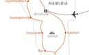 Reiseroute Namibia Eine Karte zeigt die Reiseroute durch Namibia mit Stopps in Windhoek, Etosha, Sossusvlei und Swakopmund.